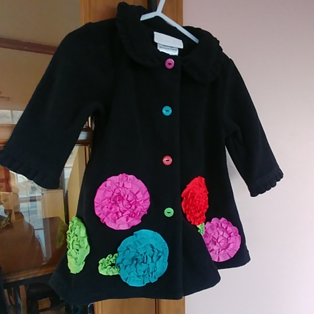 Black peacoat w colorful accents